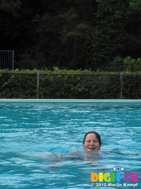 SX24140 Jenni swimming in pool